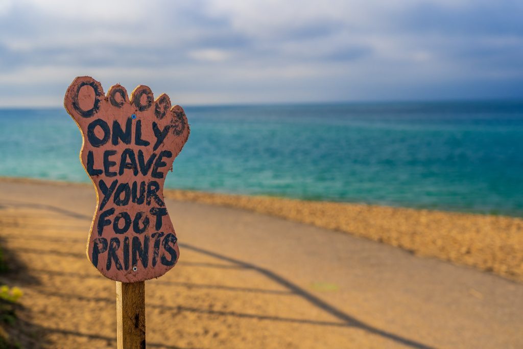 footprints sign beach
