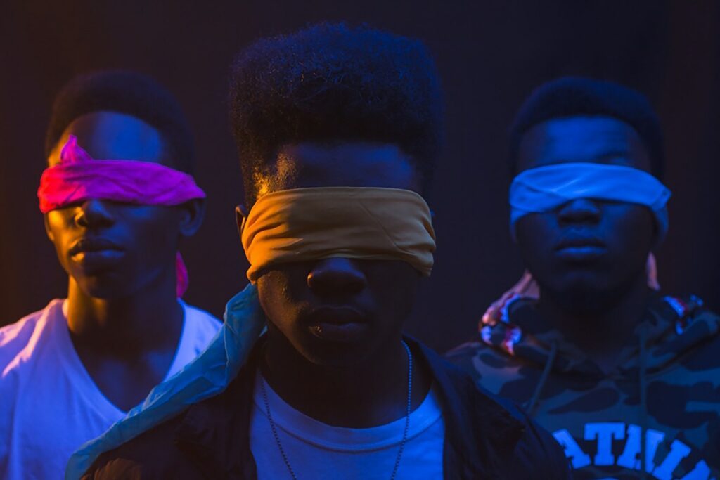 Image of young people with blindfolds on